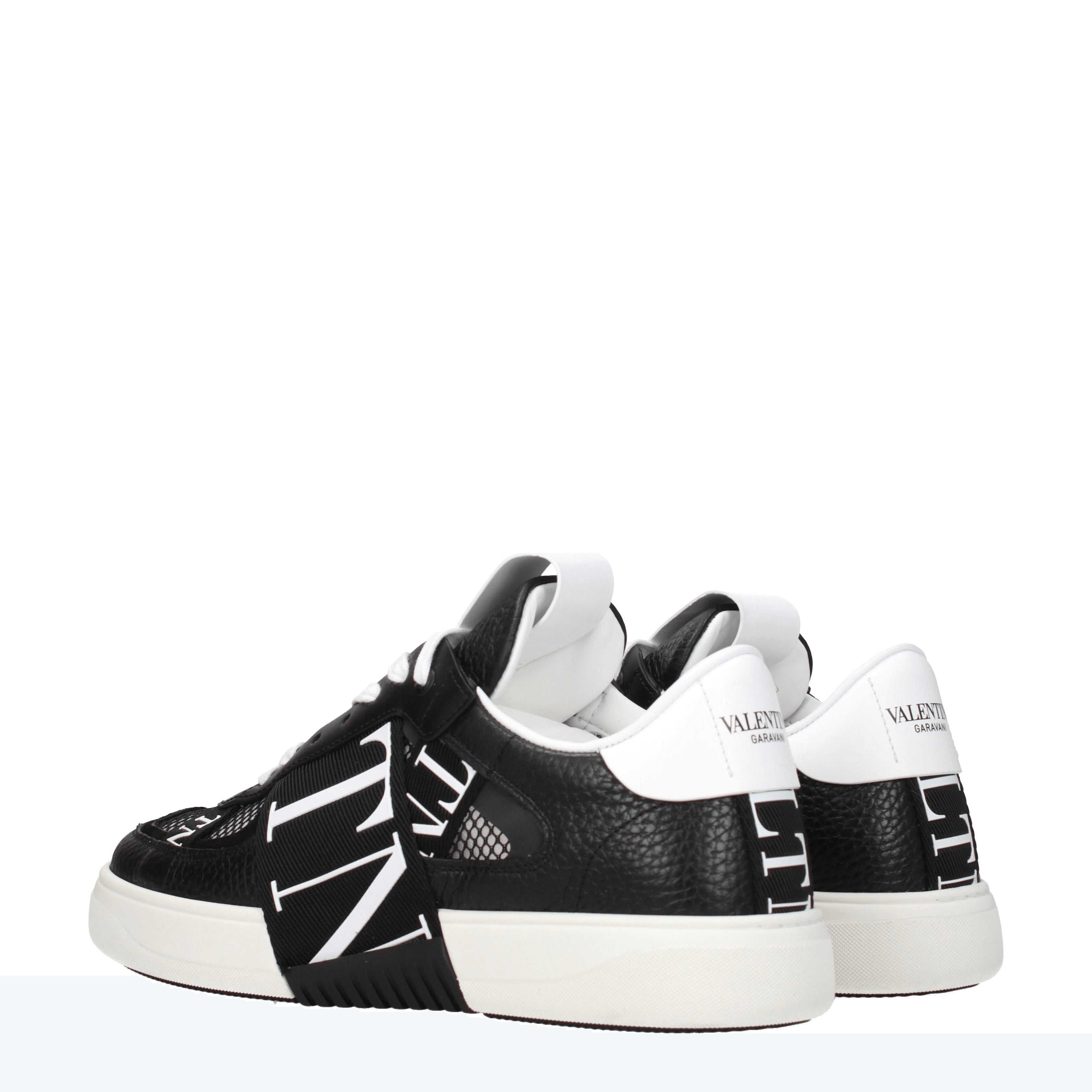 Black fashion and white valentino shoes